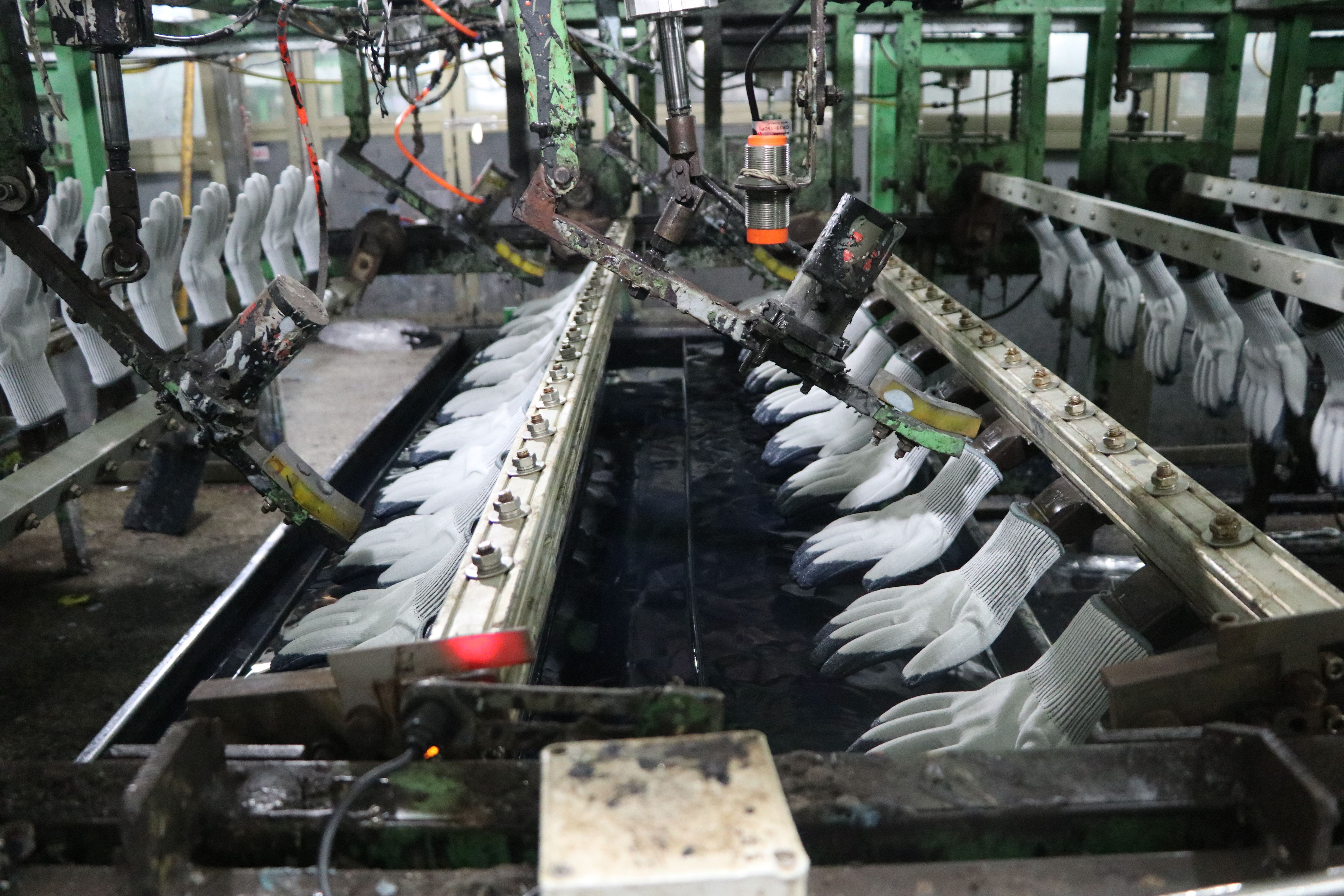 Ironclad has an extra dipping process during knit glove production to add conductivity coating for the touchscreen gloves.